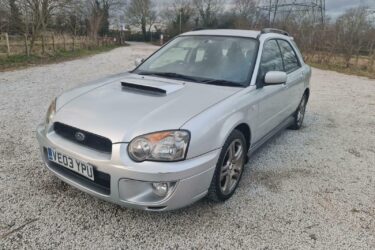 Subaru Impreza 2.0 WRX Station wagon FULL STANDARD NO MODS 220 BHP A/C Image