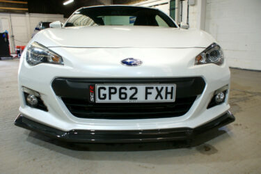 Subaru BRZ JDM finished in unmarked pearl white with APR performance carbon kit Image
