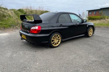 2005 55 Subaru Impreza WRX STi Blobeye Widetrack DCCD Prodrive Black - Rare Car Image