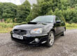 Subaru WRX saloon black mica, 2004 1 former keeper standard car with sports cat Image