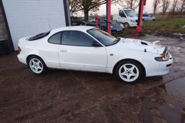 1990 Toyota celica gt -16 modern retro classic on the road with mot gt4 rally Image
