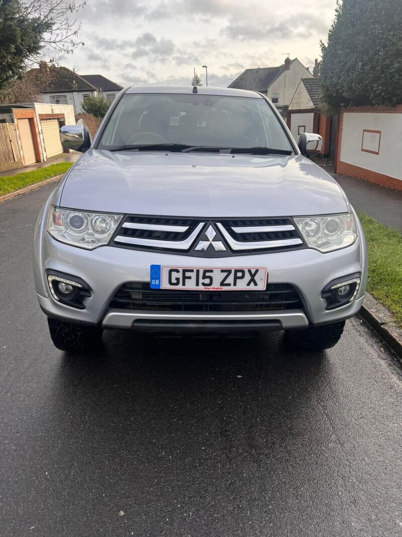 2015 Silver Mitsubishi Pickup Image