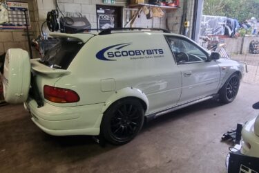 Subaru Impreza WRX gravel express van Image