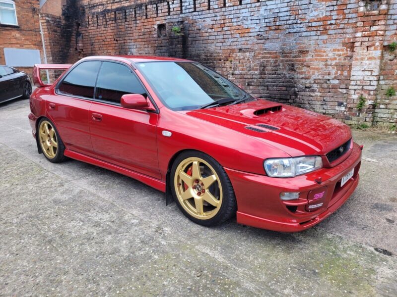 SUBARU IMPREZA UK2000 TURBO/MICA RED/LOW MILEAGE/STUNNING CONDITION Image
