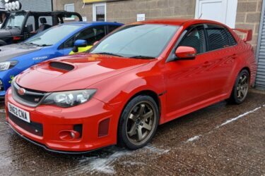 Subaru Impreza Wrx Sti Sedan 2012. Rare Red. 333bhp. Image